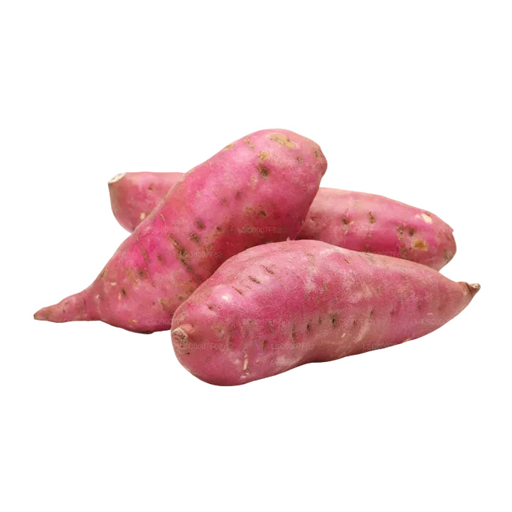 Pink sweet potatoes on a white background