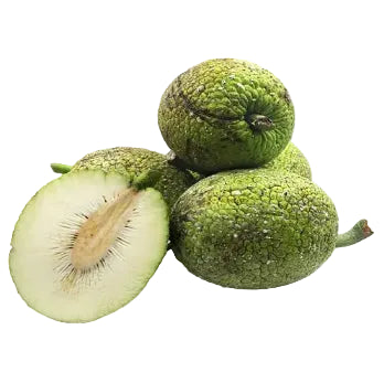 Green breadfruit with a halved fruit on a white background