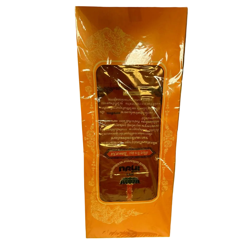 Product packaging with text and design on a green surface