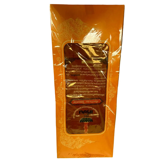 Product packaging with text and design on a green surface