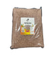 Bag of red raw rice with a label on a dark surface